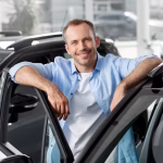 close-up-customer-with-business-person-car-dealership_23-2149117135